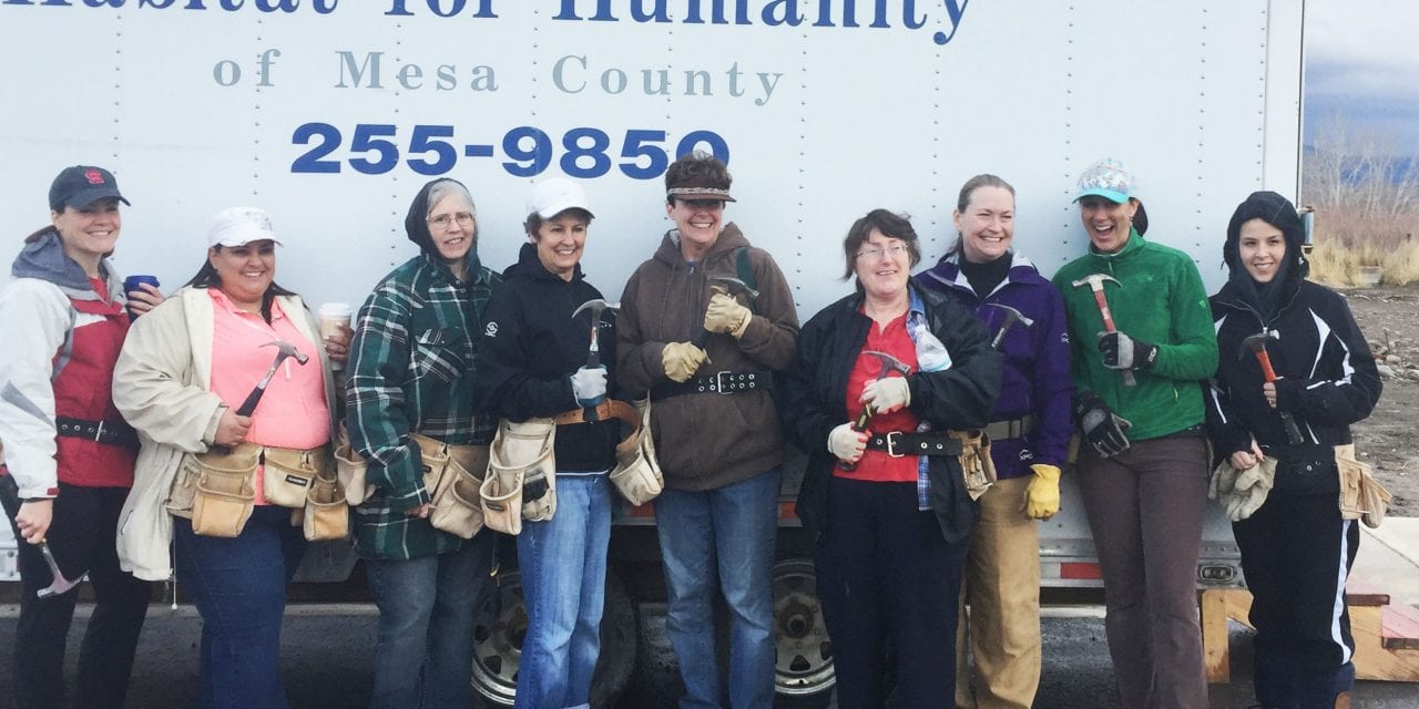 Hilltop HR Department Volunteers with Habitat for Humanity
